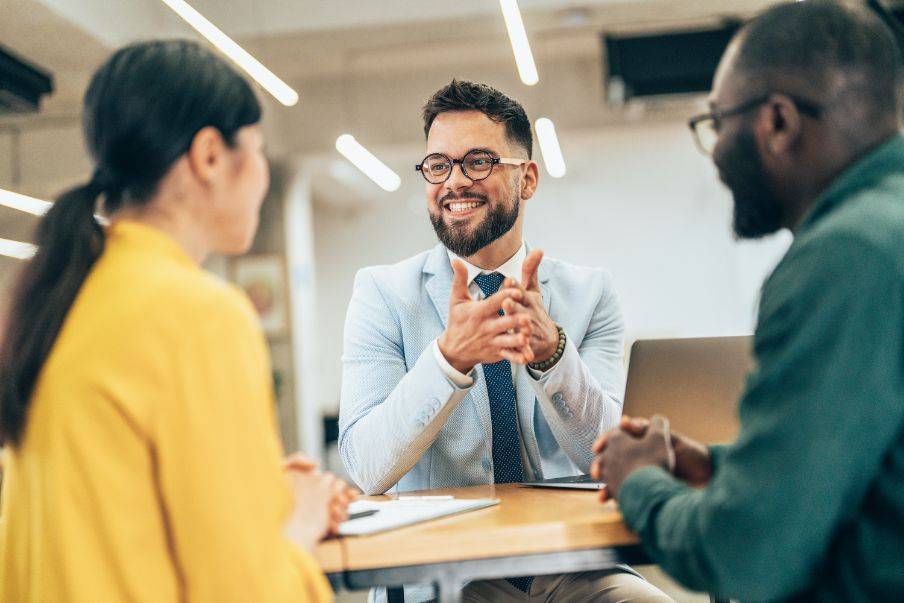 A marketing consultant providing expert advice to clients during a strategy session